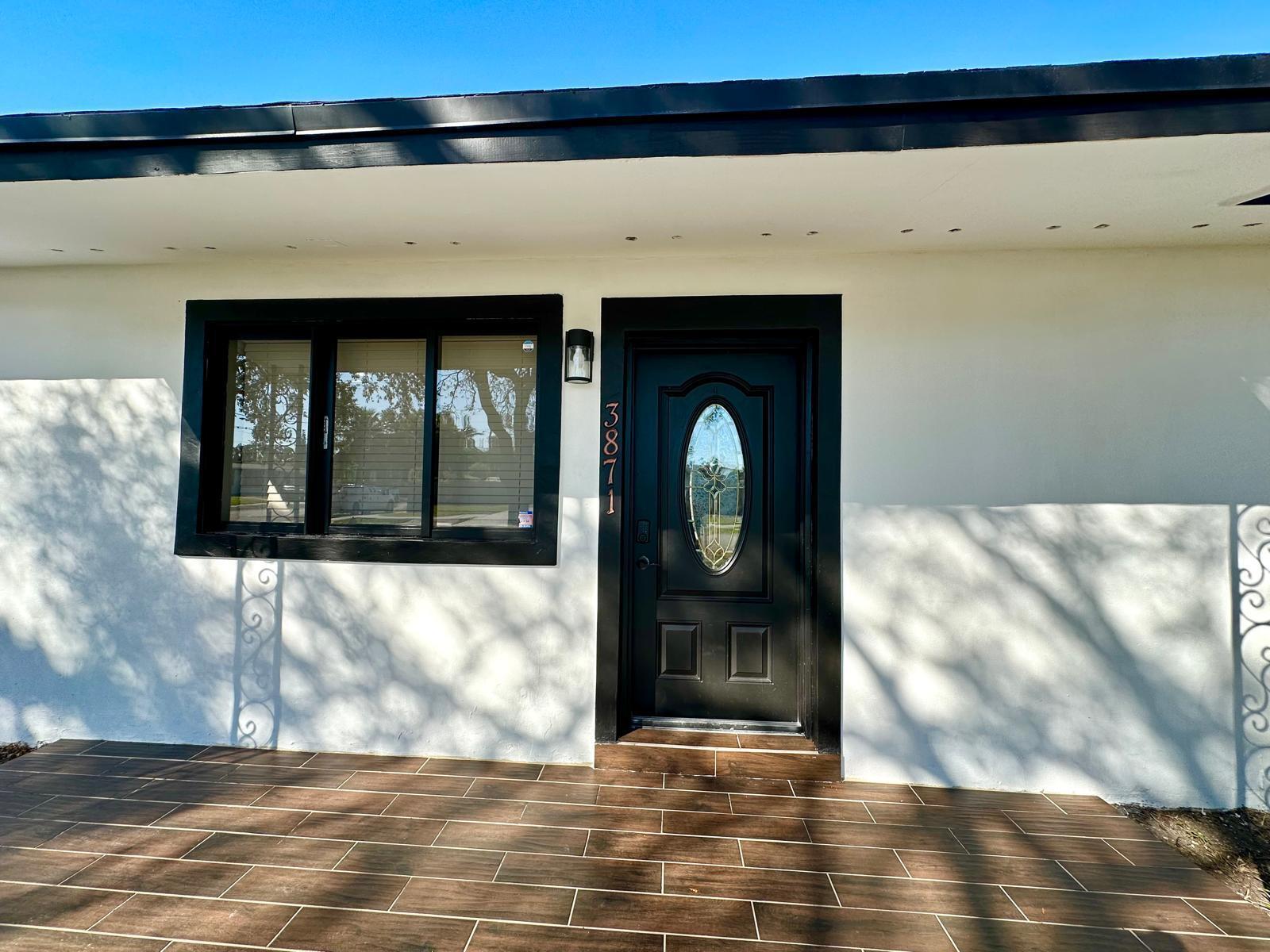 Turnkey income machine or dream family retreat on a prime corner lot in booming West Park! Just minutes to Hollywood Beach, Hard Rock Hotel & Casino, I-95, and top shopping/dining hotspots. This sprawling 5-bedroom, 3-bath beauty offers unmatched flexibility to live in, flip it, or rent it immediately! No HOA, no restrictions. Currently a successful Airbnb, it features a private suite with its own entrance, perfect for in-laws or extra rental income. The chef-inspired kitchen stuns with a high-end range and sleek overhead ventilation, ideal for gourmet meals and entertaining. Newer roof and A/C (2021) mean peace of mind for years to come.