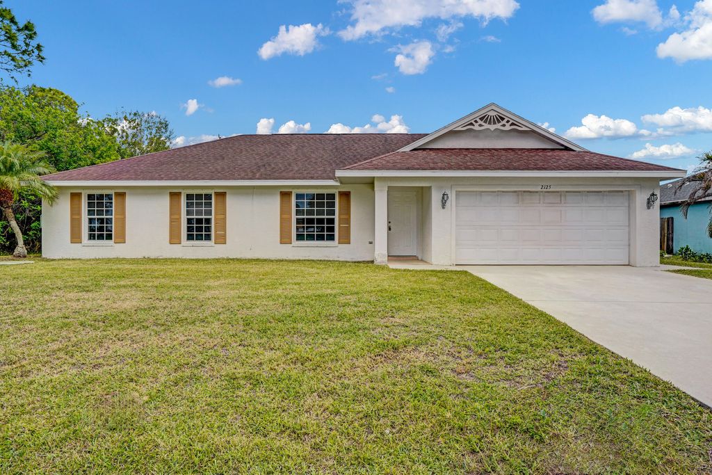 Photo of 2125 SW Salvatierra Boulevard, Port Saint Lucie, FL 34987 (MLS # B26015761)