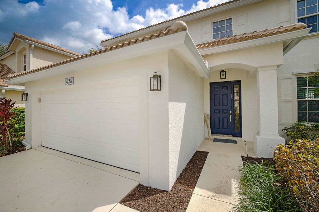 Photo of 458 Woodview Circle, Palm Beach Gardens, FL 33418 (MLS # B26003865)