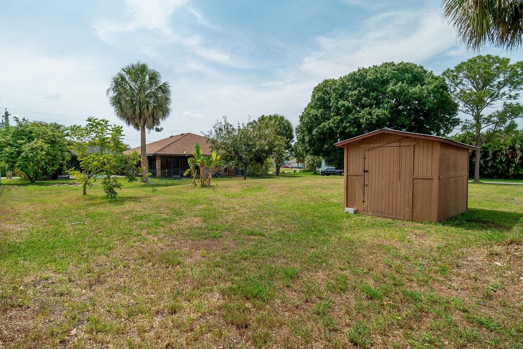 Photo of 1290 SW Thomas Court, Port Saint Lucie, FL 34953 (MLS # R10989794)