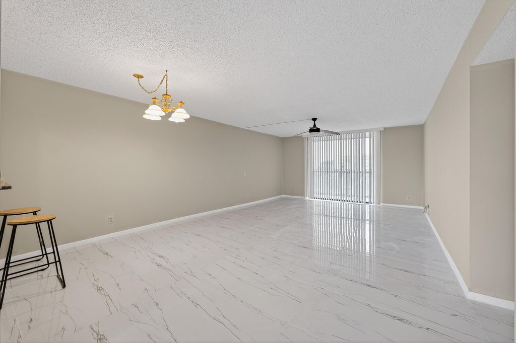 Photo of 2828 Tennis Club Drive #403, West Palm Beach, FL 33417 (MLS # R11160030)