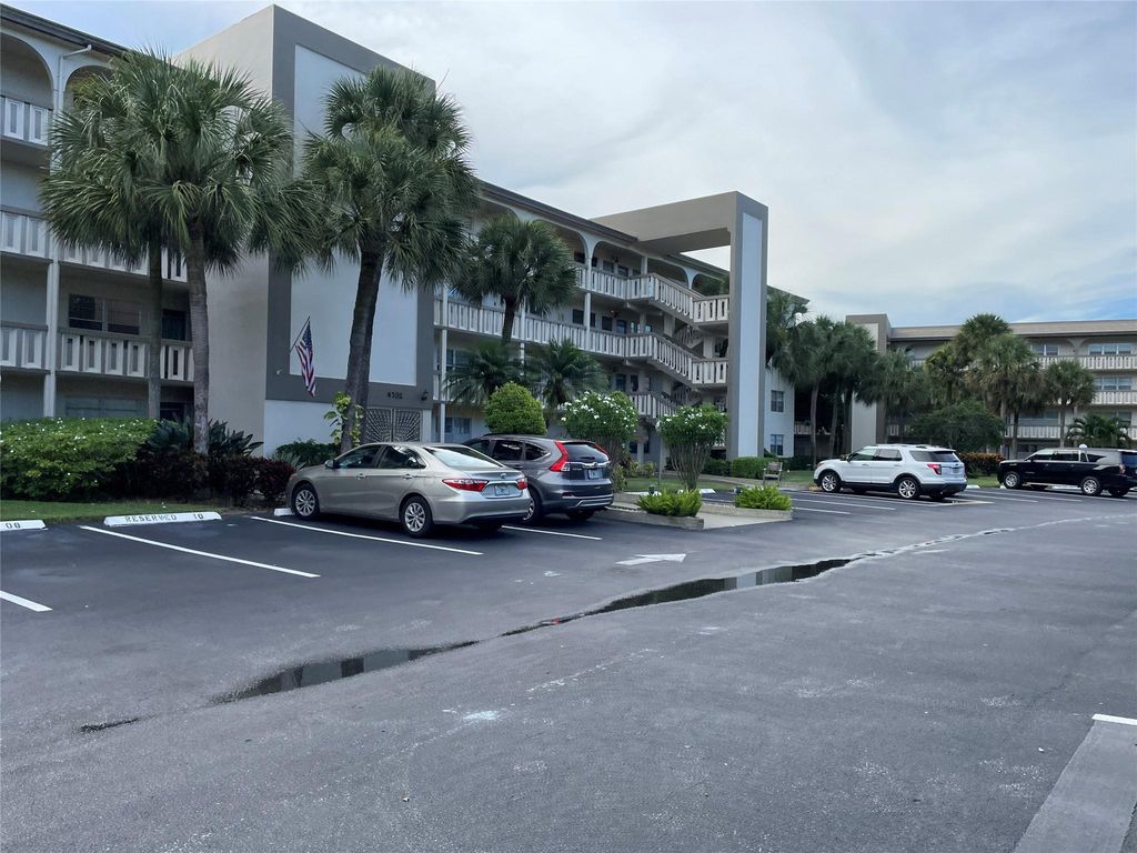 Photo of 4702 Martinique Dr #A2, Coconut Creek, FL 33066 (MLS # F10394706)