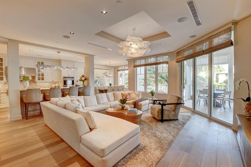 Designer Chris Leighton's masterful sense of timeless elegance is immediately felt upon entering this beautiful home. His redesign of the original floor plan to a three bedroom, three and a half bath, office and enlarged laundry room allows for the optimal use of living space. Exquisite wall coverings, chandeliers and cabinetry are found throughout. Very large covered balcony accessible from both living room and master bedroom allows for comfortable outdoor living.Ten foot ceilings coupled with impact glass sliding doors & windows provide natural light .Designer kitchen is equipped with Wolf gas range/ grill/griddle and double ovens,Sub Zero fridge and wine cooler, and built in Miele cappuccino/espresso machine. Membership to both The Seagate Beach Club and Golf & Country Club are included