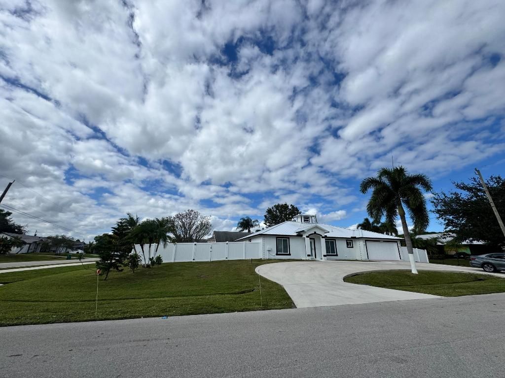 Photo of 5403 NW Chicopa Street, Port Saint Lucie, FL 34983 (MLS # R11139568)