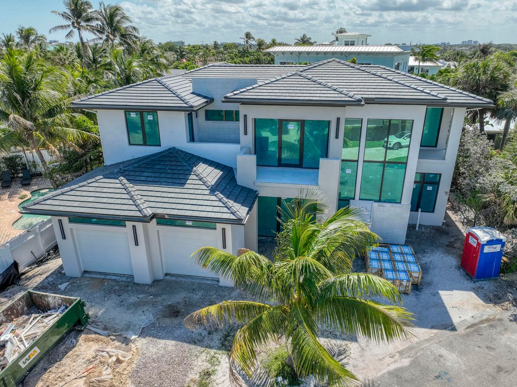 Photo of 430 Jupiter Lane, Juno Beach, FL 33408 (MLS # R10968382)