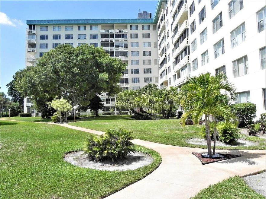 Lovely 1/1/1 unit in a well-managed over-55 secure building ready for you to move right in. Completely furnished and equipped. See attached inventory. Tile and laminate flooring throughout. Beautiful views of pool and gardens. A/C /water heater 4 years old. Updated bathrooms. Kitchen has two large moveable pantries. Building has just completed remodeled lobby and hallways. Interior/exterior repainted. Plumbing risers have been replaced AND building has Blue Stream Fiberoptics. Maintenance fee covers everything except electric and phone. Parking space #7. Amenities include Clubhouse with outdoor BBQ/Bar area and indoor kitchen. Heated pool in front of secured walking trails around the lake behind the building. Pickleball/tennis courts are available for a nominal fee.