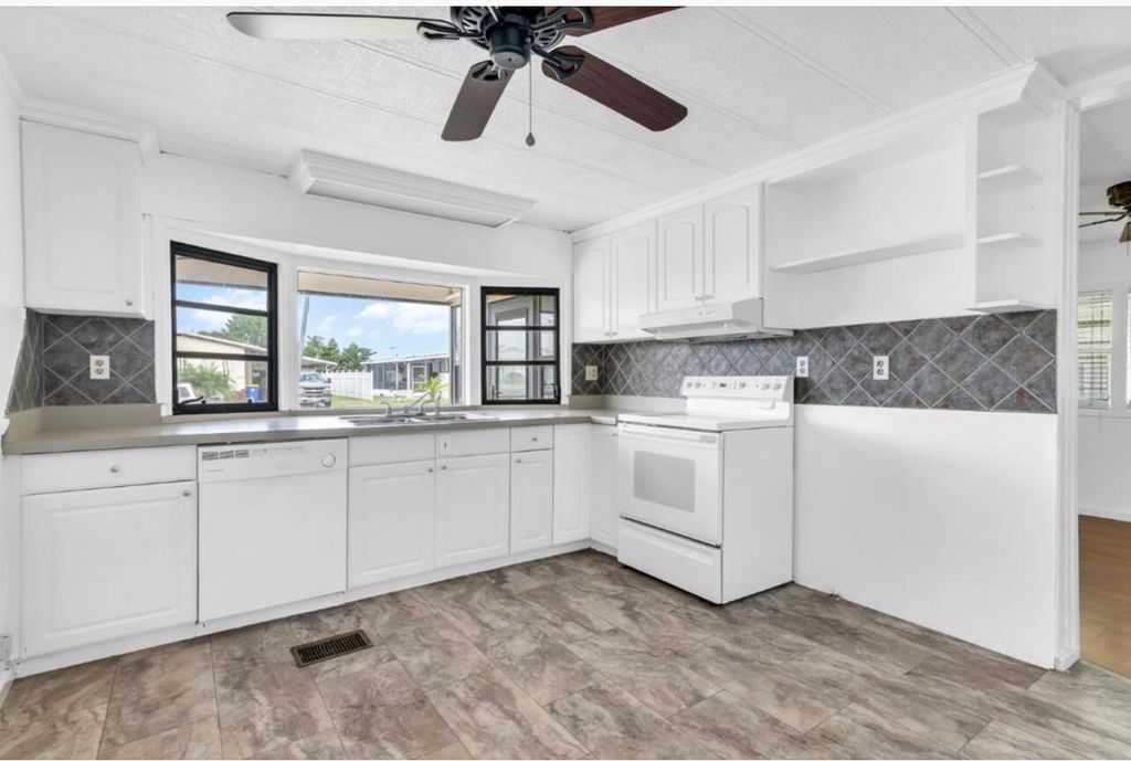 Photo of 7099 SE Bluebird Circle, Hobe Sound, FL 33455 (MLS # R11008901)