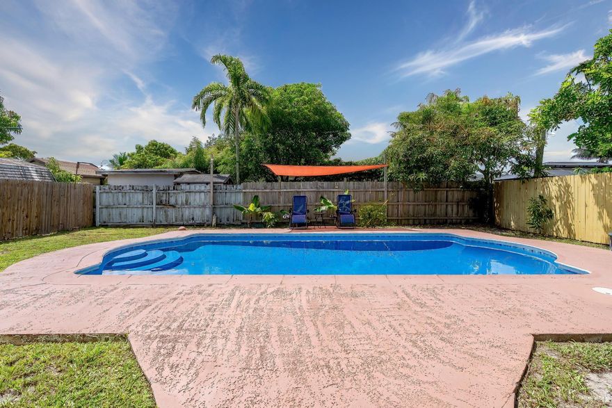 Inviting 2-Bed/1-Bath, Private, Single with a Sparkling Inground Pool! Move-in ready and checks all the boxes: New Roof, Impact Windows and Glass Door, New Flooring, Newly Renovated Bathroom, Open Kitchen with SS Appliances, Upgraded Electric, HVAC 2020, New Marzite Bright Blue/Turquoise Finishing for the In-ground Pool, Drinking Water Softener/Filtration System, Freshly Painted Interior, Utility/Laundry plus Outside Shed. The Home is Immaculate and thoughtfully Renovated with Added Value. The Huge Back Yard is fenced with a 24 X 12' In-Ground Pool, and a 34 X 37' Patio Area. Perfect for Entertaining and Grilling on sunny days and cool, moonlit evenings. Located in the cennter of Miramar, just minutes from Highways, Shopping and Convenience. The Perfect home with endless Charm and Privacy.