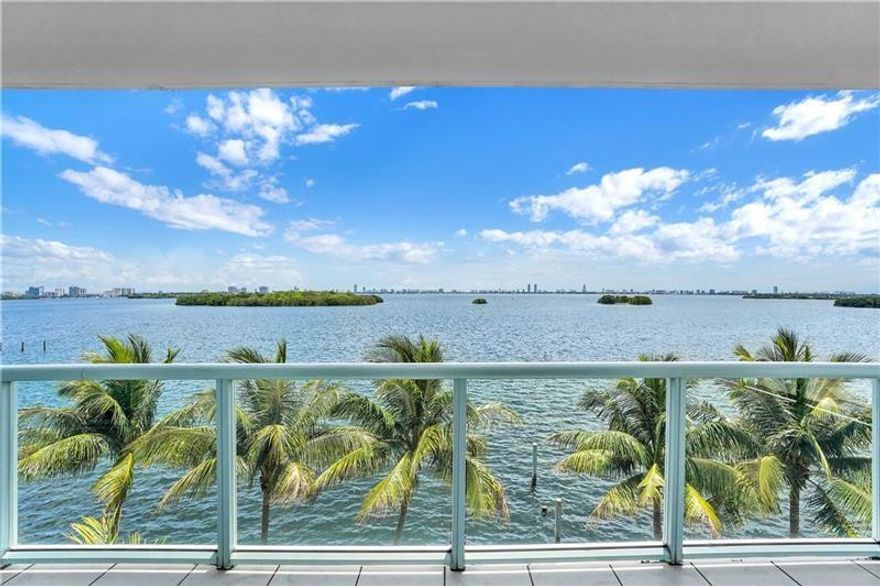 Welcome to Morning Side Miami and this secret oasis with expansive views of Biscayne Bay. 2 bed 2.5 bath, light and bright corner unit nestled in the boutique building IOS. Split and open floor plan with a 470+ sq ft wrap-around balcony overlooking the pool, and bay. Freshly painted and ready for move-in! Porcelain and wood floors, granite countertops, Miele, Jennair and Liebherr appliances. 2 parking spaces. Small fitness center. Large additional storage unit. Pet friendly. Secure and gated parking with excellent onsite management. 15 minutes away from the Miami airport, Wynwood, Midtown, Design District, Miami Beach, Downtown and Brickell area. This is truly a hidden gem you'll want to see!