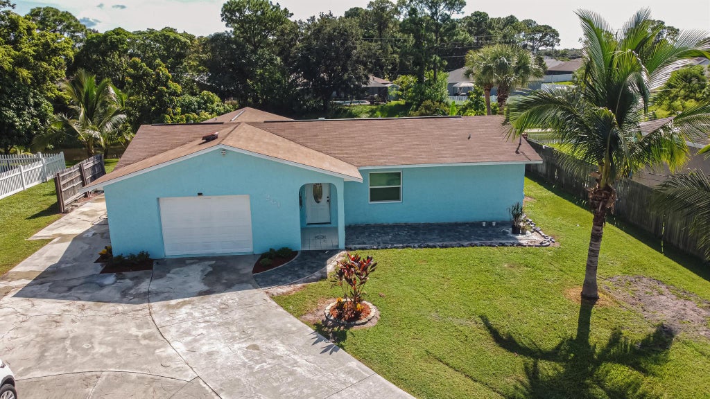 Photo of 261 SE Whitmore Drive, Port St Lucie, FL 34984 (MLS # R10899235)