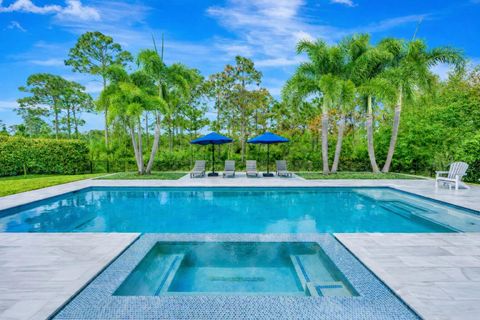 Photo of 8150 SE Grassy Hollow Trail, Jupiter, FL 33458 (MLS # R11165317)