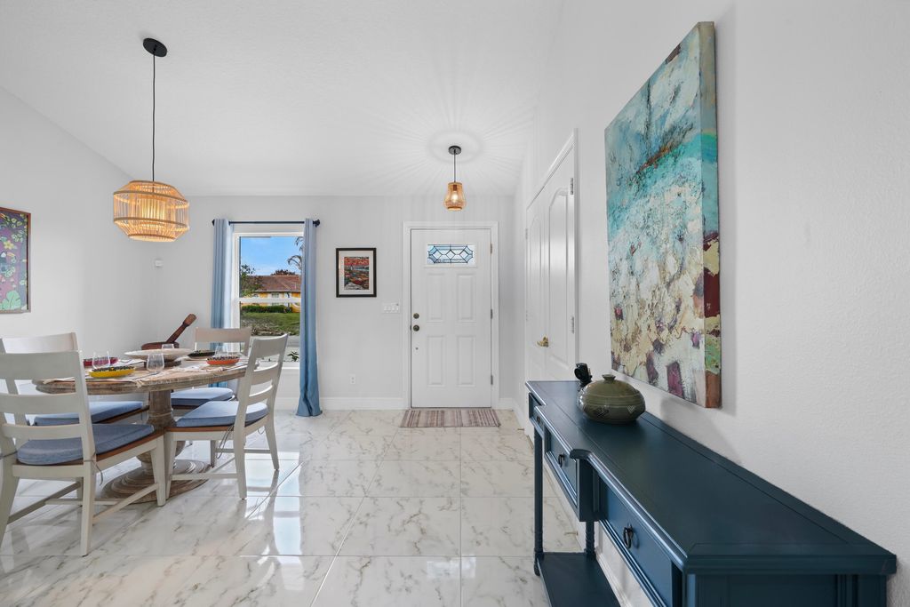 Photo of 685 SW Homeland Road, Port Saint Lucie, FL 34953 (MLS # B26016397)