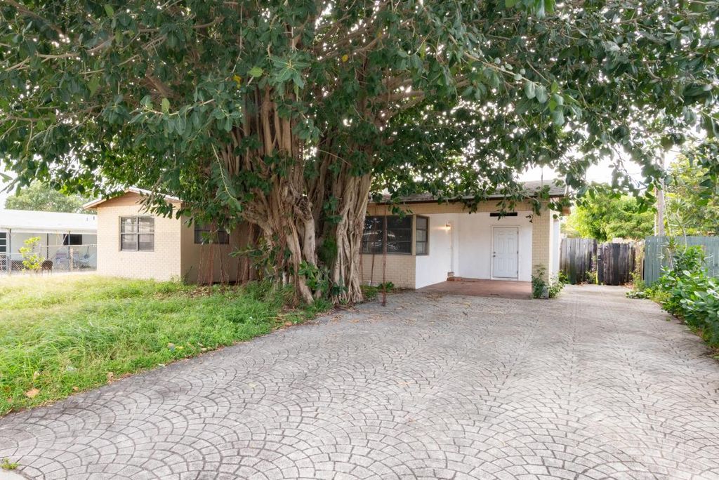 Photo of 1491 NW 1st Street, Boynton Beach, FL 33435 (MLS # R11158401)