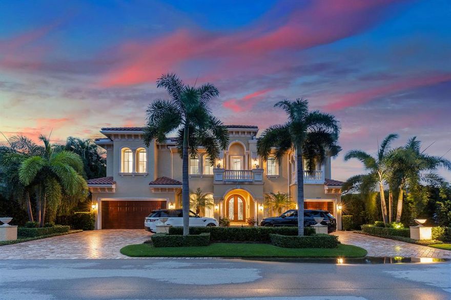 Located in a private cul-de-sac, this 7,400 SF 5-bed, 5.5-bath home is a symbol of intracoastal elegance. Resting on an 88' deep water lot equipped with a stainless-steel ramp, floating dock & water light package, this property is a true yachtsman's dream w/direct ocean access. Enter into an impressive 23' ceiling adorned with designer chandeliers & custom LED lighting, with floor-to-ceiling impact windows that offer substantial natural light. The chef's kitchen features a 6-burner Wolf stove, double dishwashers, double ovens & sinks, as well as an exquisite custom glass wine display. Equipped with an elevator, full house generator, underground utilities with natural gas, tile finished garages with AC & a full Ring security system, no detail was spared in creating this waterfront paradise Kick back & relax or entertain your guests in either the Man Cave with 5 TVs, 2-level seating & a custom lighting package, or in the Lady Cave that offers a serene ambiance & rosé refrigerator. Outside, enjoy an outdoor TV with sound system, a summer kitchen & pool with water views.