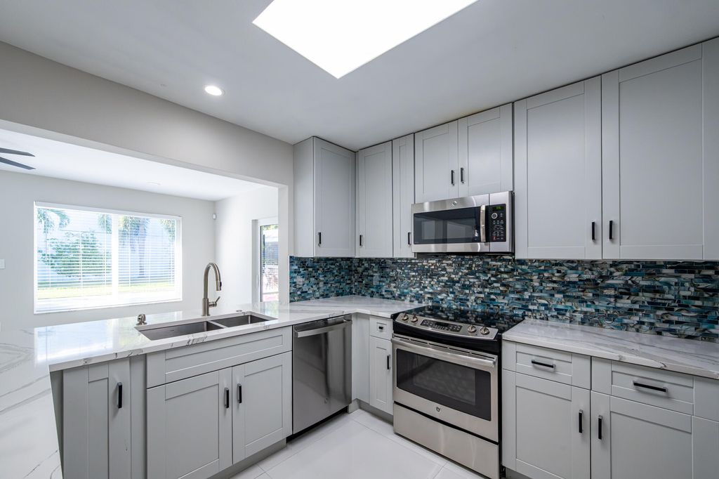 Photo of 10339 Daphne Avenue, Palm Beach Gardens, FL 33410 (MLS # R11143018)