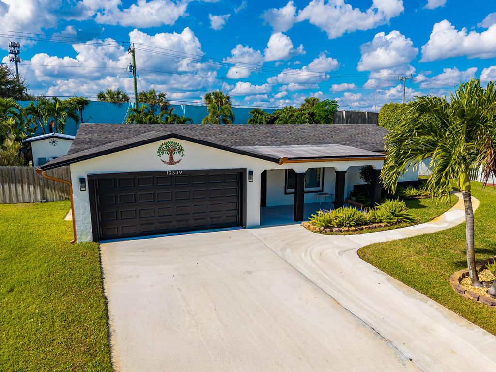 Photo of 10339 Daphne Avenue, Palm Beach Gardens, FL 33410 (MLS # R11143018)