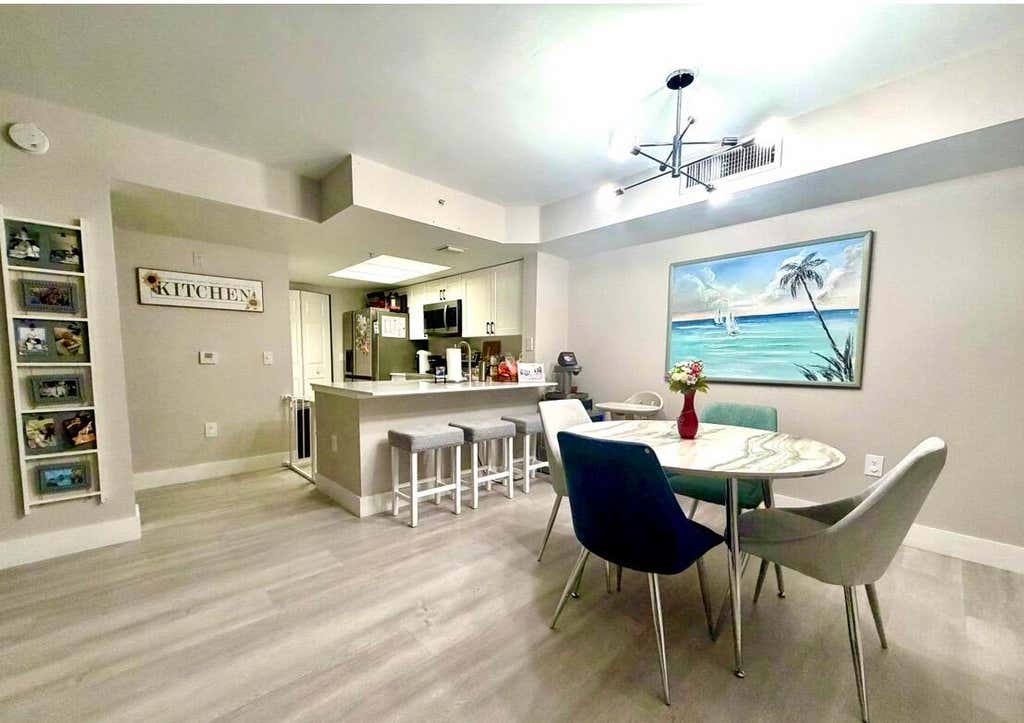 Photo of 5550 Wiles Road #Unit 105, Coconut Creek, FL 33073 (MLS # B26064685)