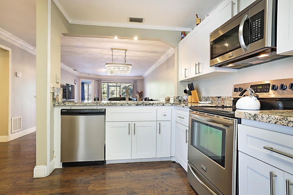 Photo of 303 Harbour Pointe Way, Greenacres, FL 33413 (MLS # R10966252)