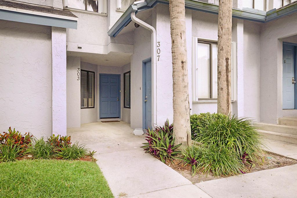 Photo of 303 Harbour Pointe Way, Greenacres, FL 33413 (MLS # R10966252)