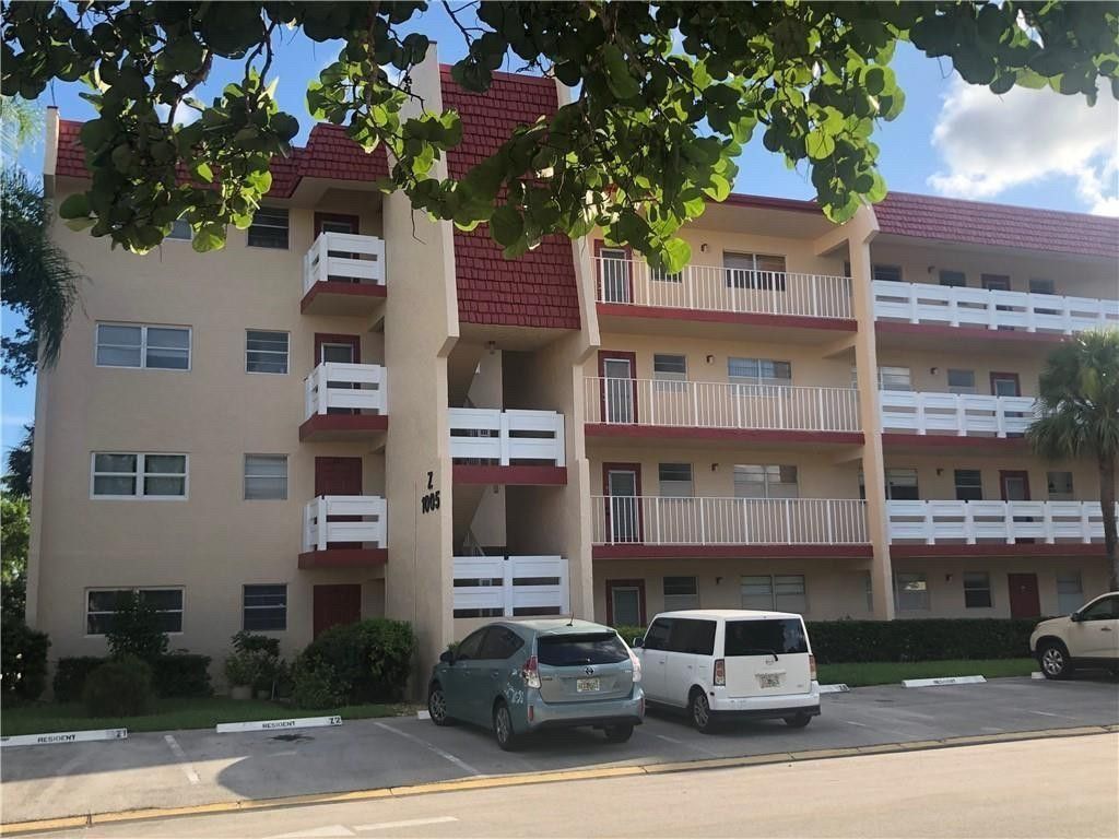 Photo of 1005 Country Club Drive #303, Margate, FL 33063 (MLS # B26023540)