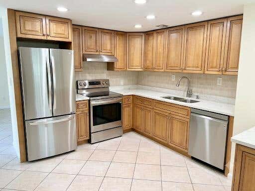 Photo of 1015 Ainslie A Drive, Boca Raton, FL 33434 (MLS # B26045627)