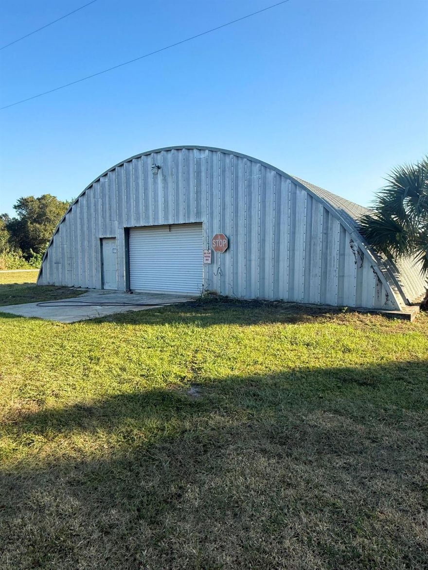 If you need real storage space, here's the move. This 2,550 square foot Quonset-style hangar sits on a private stretch of Ralls Road in Fort Pierce and gives you wide open floor space for vehicles, equipment, or personal storage. Concrete slab. Fully enclosed. Oversized roll-up door. Exactly what you need if you're tired of squeezing things into small units. The hangar has 220V power, water access, and plenty of room to configure your storage however you want. This is strictly for storage use only, no business operations, which keeps the environment quiet and private. Location is clutch. You're right off Selvitz Road with fast access to I-95, the Turnpike, and all major corridors through St. Lucie County.