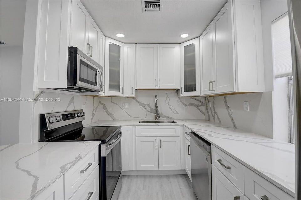Photo of 318 Monaco G, Delray Beach, FL 33446 (MLS # R10966524)