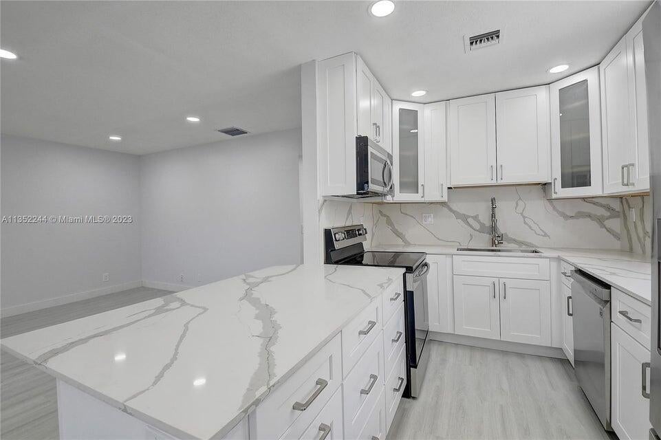 Photo of 318 Monaco G, Delray Beach, FL 33446 (MLS # R10966524)