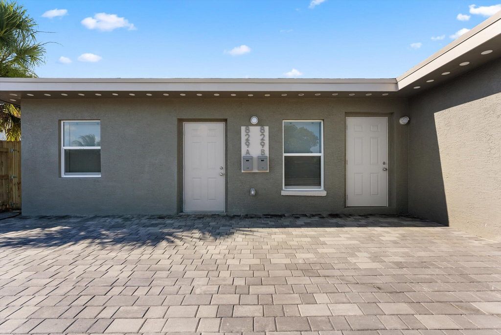 Photo of 829 Bayberry Drive #A, Lake Park, FL 33403 (MLS # R11018342)