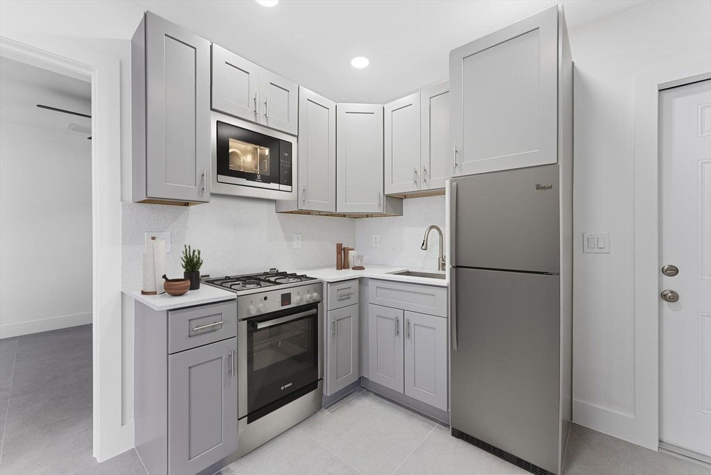 Photo of 829 Bayberry Drive #A, Lake Park, FL 33403 (MLS # R11018342)