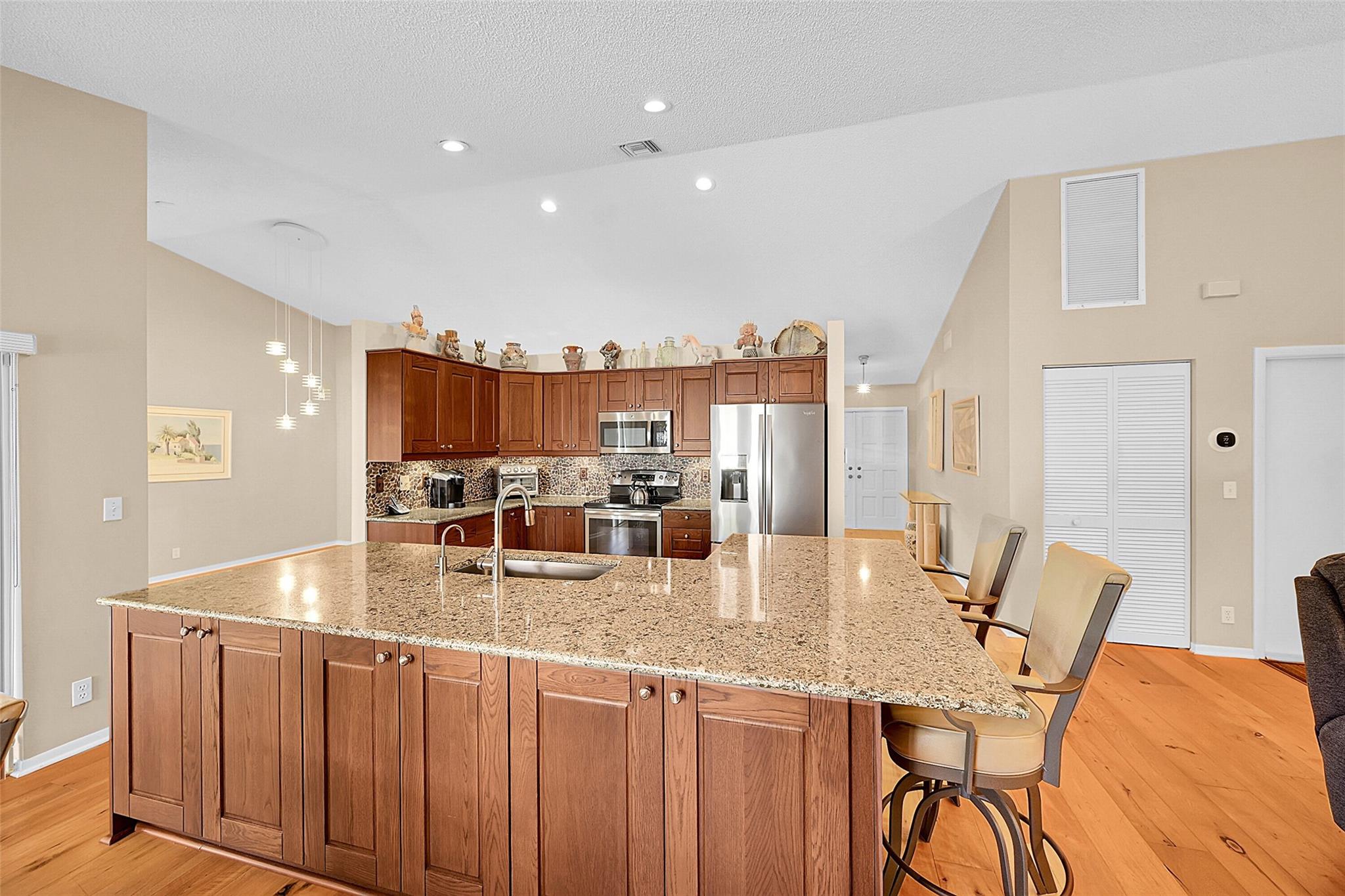 Beautifully maintained 4BR/3BA home on a quiet cul-de-sac in North Springs—no HOA! Features split-bedroom layout, spacious master with dual walk-in closets, open chef’s kitchen, and engineered hardwood floors throughout. Enjoy newer A/C, 2009 roof, built-in vacuum, leaf guard gutters, and hurricane-rated garage doors with accordion shutters. Set on a large private lot and lovingly cared for by original owners, this home blends comfort, style, and peace of mind. Don’t miss this North Springs gem—schedule your showing today!