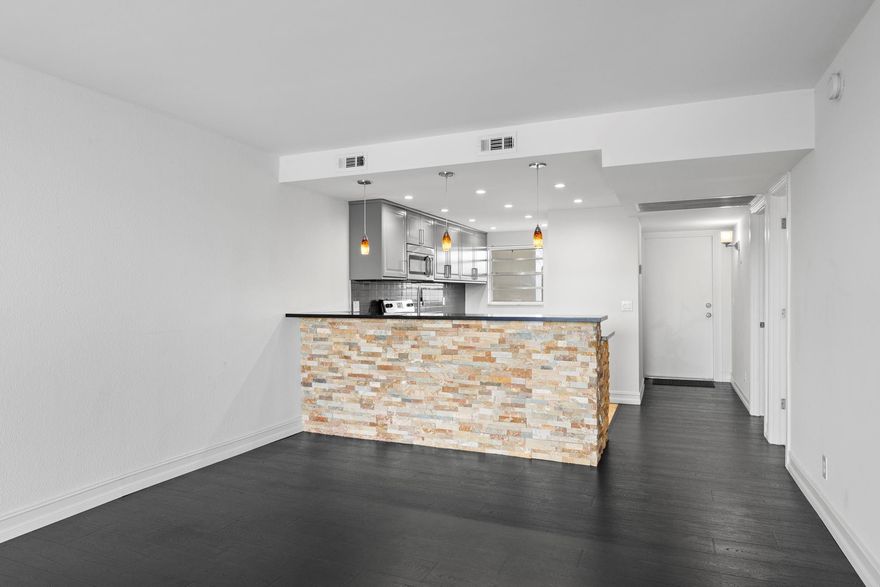 This condo located on the fourth floor with spectacular views of the golf course and lake, is in pristine condition.  Upgraded laminate flooring, custom lighting, granite counter tops in kitchen.  All you need to do is bring your furniture.  Accordion shutters.  Laundry facilities on 4th floor.  Storage unit available.  In addition to the application fee of $150.00, once there is an approval and prior to moving in, tenant must provide a check or money order for $500 as security deposit for Common Elements, refundable upon move out.  $100 for security deposit, refundable upon return of Country Club I.D. cards, guest hangers, laundry card and pool key.  $500 refundable deposit for move-in Elevator pads as security deposit.  Check is held to make sure the move-in rules are adhered to.