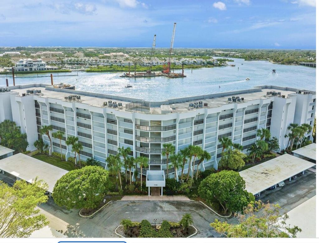 Photo of 1748 Jupiter Cove Dr #121, Jupiter, FL 33469 (MLS # R11160922)