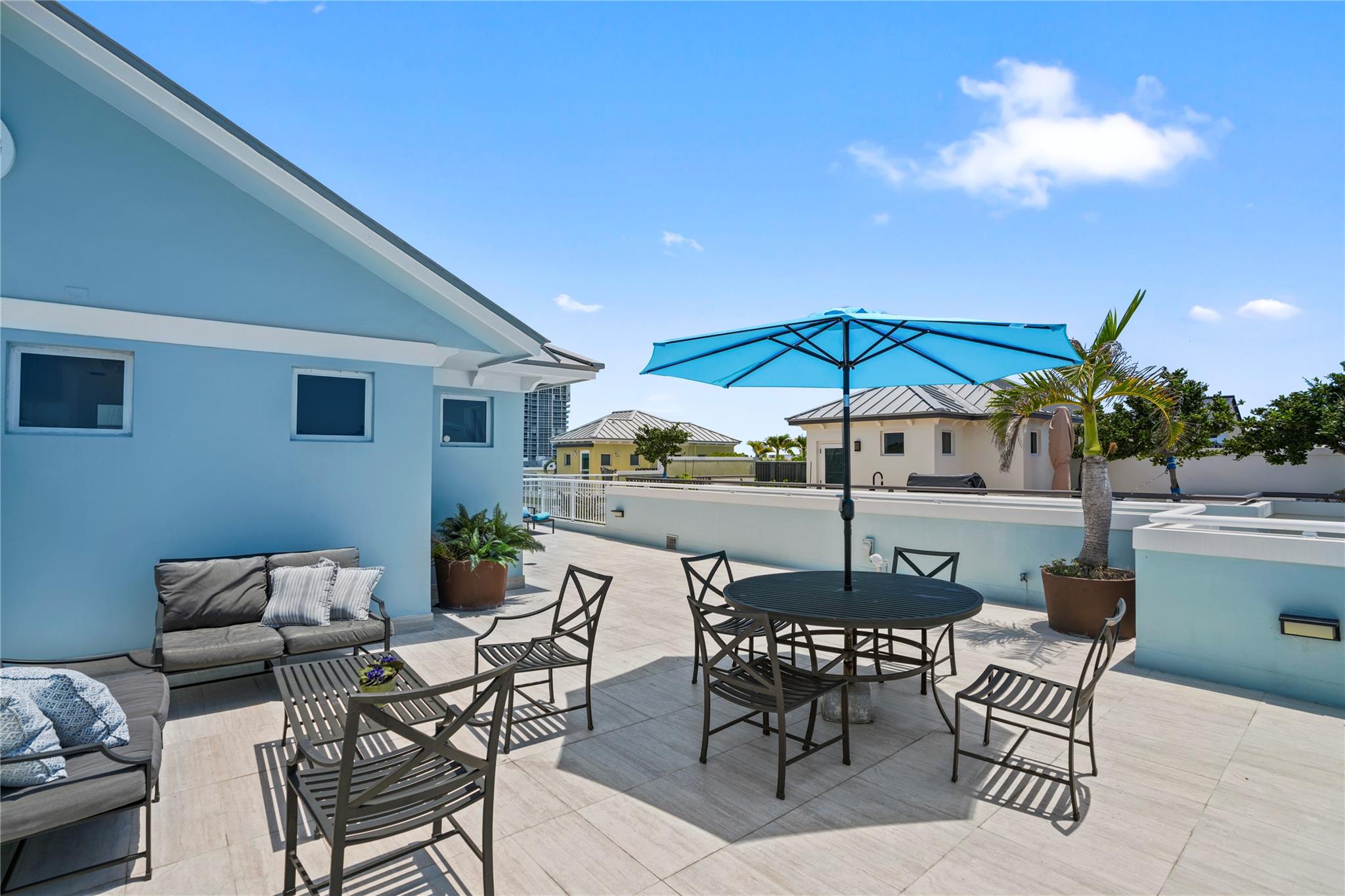 Stunning 5 bed / 4 bath townhouse just steps from the beach! Very low HOA and NO RENTAL RESTRICTIONS—offering excellent flexibility for short-term rentals or personal use. Features include a modern gourmet kitchen with Miele appliances and quartz countertops, impact windows, private elevator, and 2-car garage. Enjoy very spacious bedrooms and a rooftop terrace with beautiful ocean and Intracoastal views—Jacuzzi-ready with connections in place. Easy access to the famous Surf Road with scenic bike trails leading to restaurants, bars, playgrounds, nature parks, and the Dania Beach Pier. A rare opportunity to own a luxury coastal property in a prime location with strong investment potential.