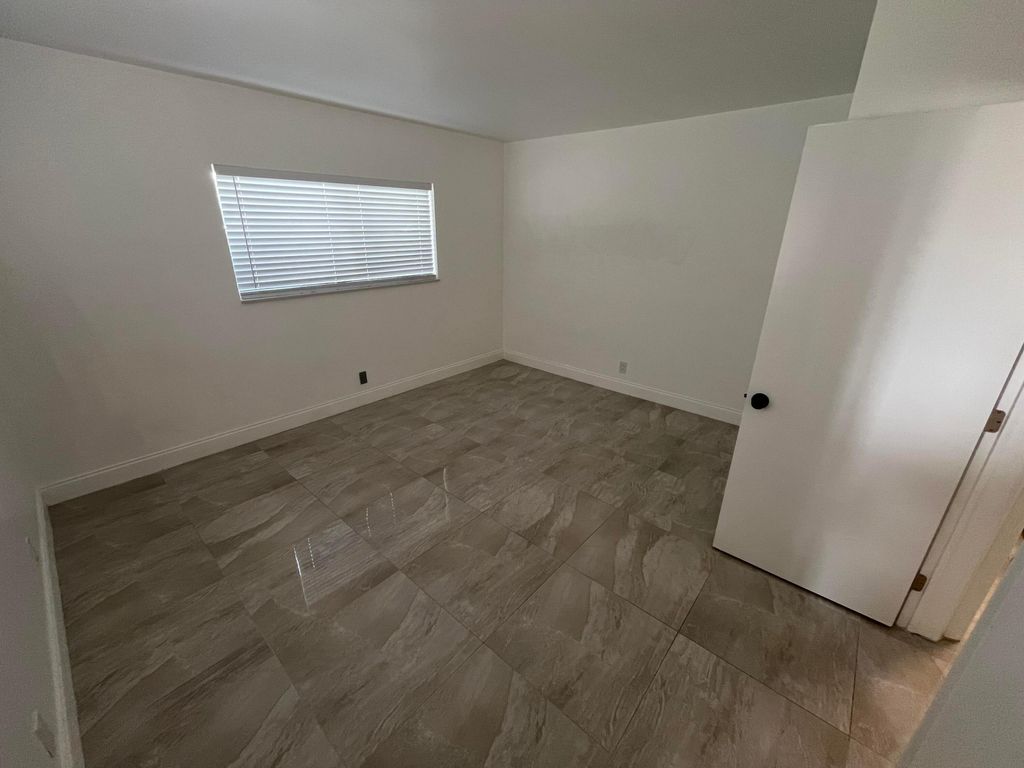 Photo of 1019 SE 3rd Street #3, Deerfield Beach, FL 33441 (MLS # B26013830)