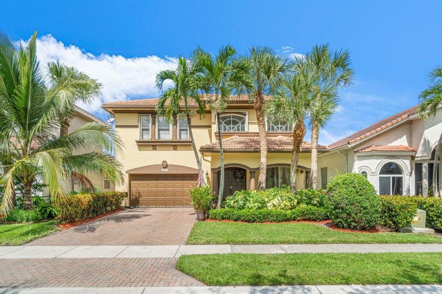 Gorgeous Lake front home in highly desirable Bent Creek.  Located off Lyons Rd this boutique community has a low HOA and close to a Turnpike exit. Property has been meticulously maintained and cared for. 4th bedroom is only partially closed in, but can easily be fully finished.  Volume ceilings, open kitchen, living and family rooms, lake and fountain views. Oversized master with his and her walk in closets. Hurricane protection for the windows. Gated community with community pool and entertaining area.