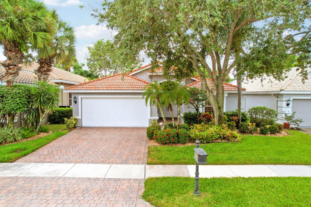 Photo of 7428 VIA LURIA, Lake Worth, FL 33467 (MLS # B26069297)