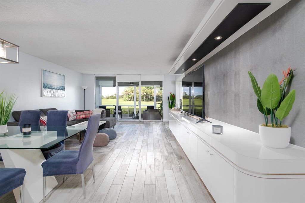 Photo of 2671 S Course Drive #101, Pompano Beach, FL 33069 (MLS # R10899737)