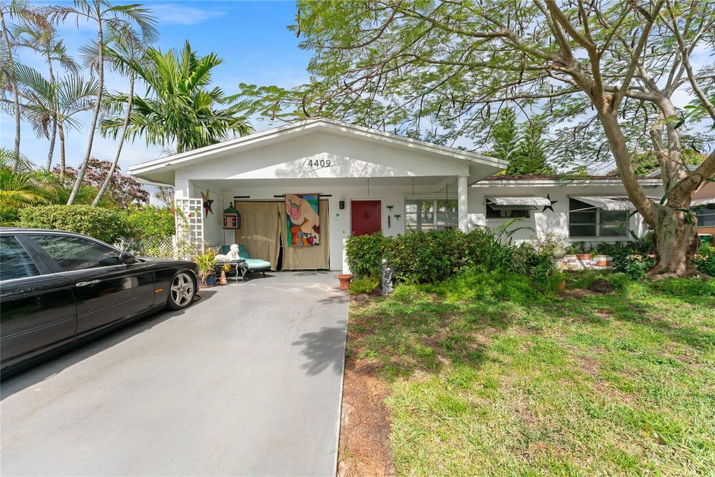 Photo of 4409 NW 45th Court, Tamarac, FL 33319 (MLS # F10485456)