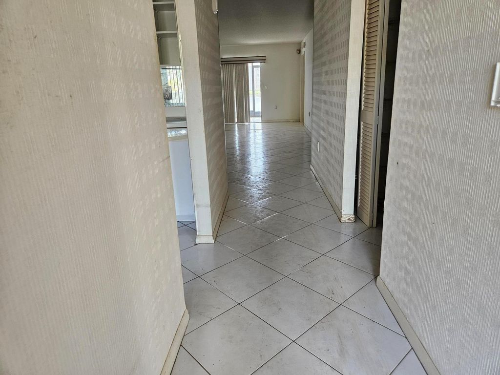 Photo of 6065 Pointe Regal Circle #105, Delray Beach, FL 33484 (MLS # F10556437)