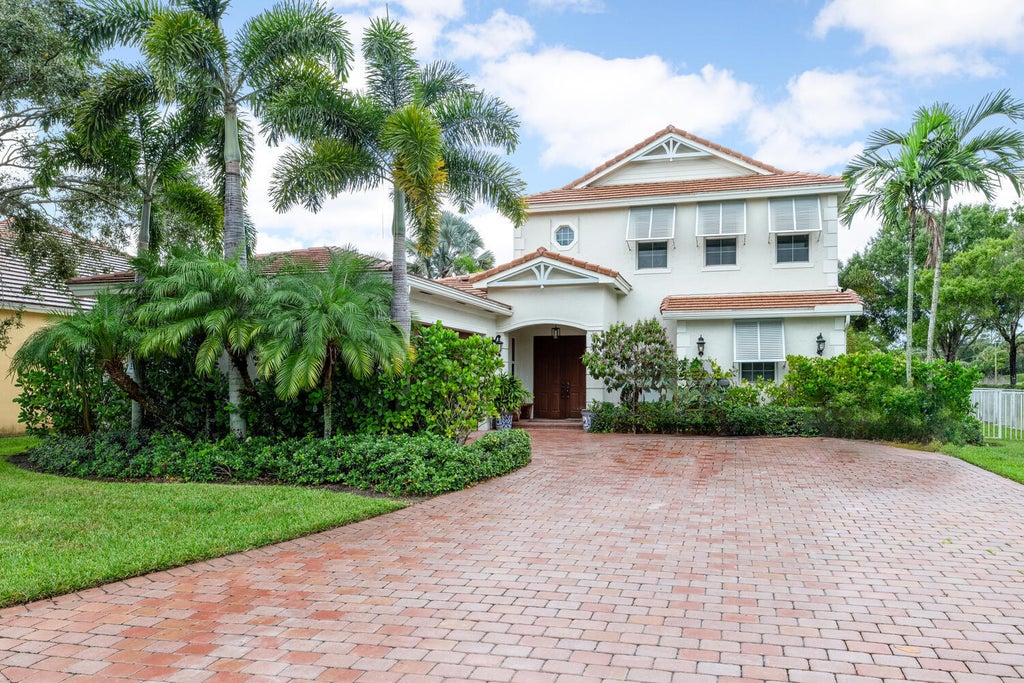 Photo of 9241 Madewood Court, Royal Palm Beach, FL 33411 (MLS # R11073859)