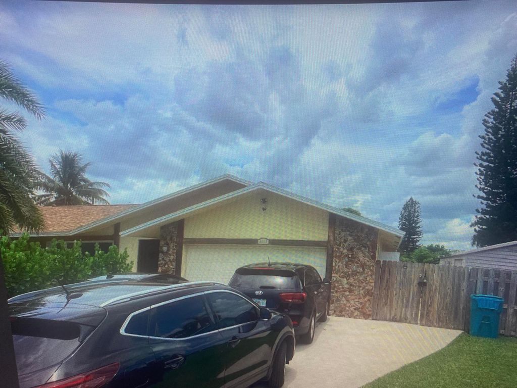 Photo of 1111 NW 8th Court, Boynton Beach, FL 33426 (MLS # R10994064)