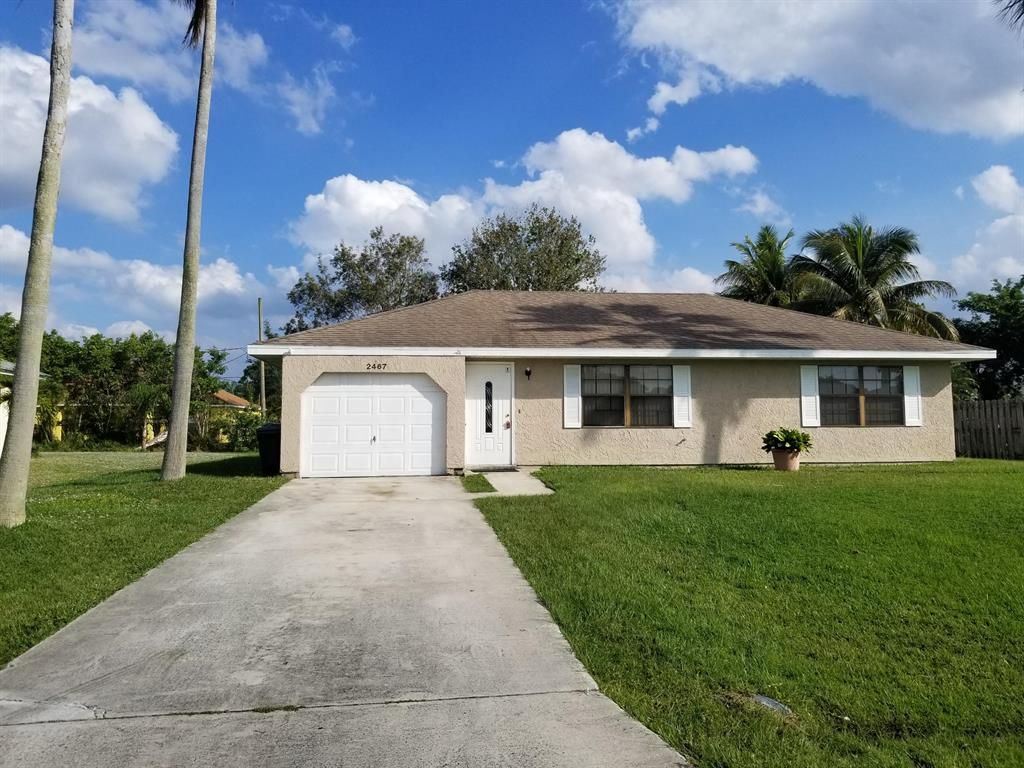 Photo of 2467 SE Marseille Street, Port Saint Lucie, FL 34952 (MLS # R10762377)