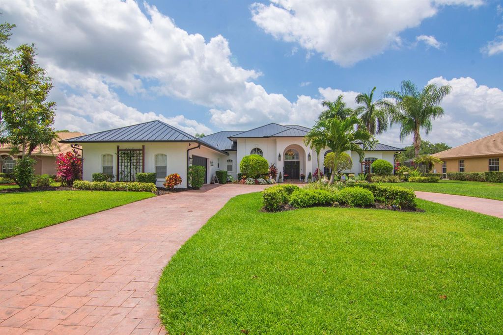 Photo of 9515 Laurelwood Court, Fort Pierce, FL 34951 (MLS # R10989860)