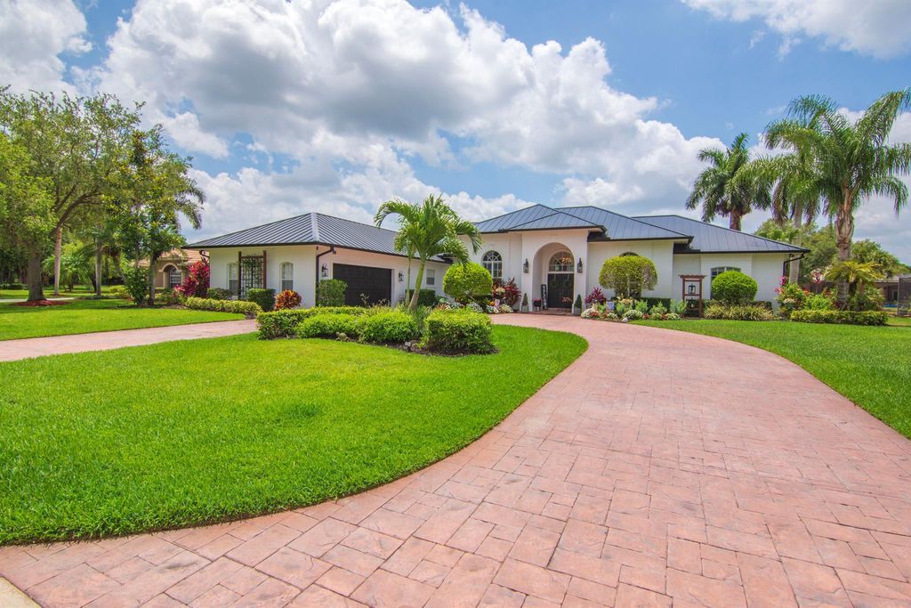 Photo of 9515 Laurelwood Court, Fort Pierce, FL 34951 (MLS # R10989860)