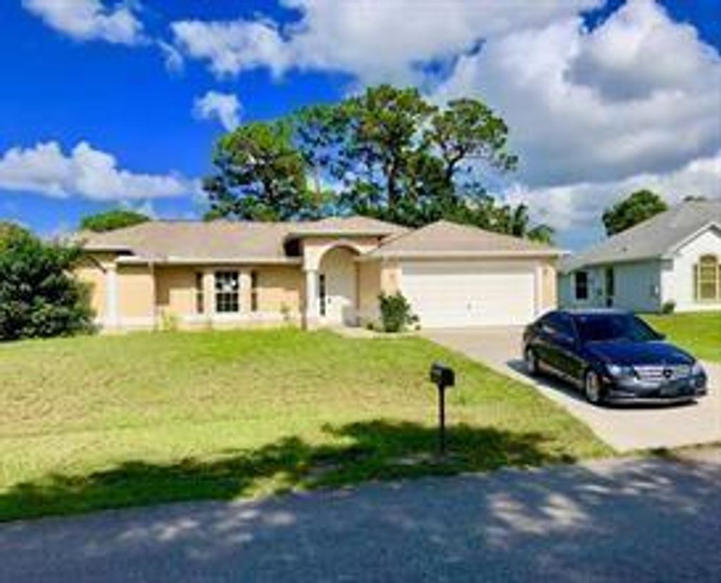 Photo of 673 SW Homeland Road, Port St Lucie, FL 34953 (MLS # F10355718)