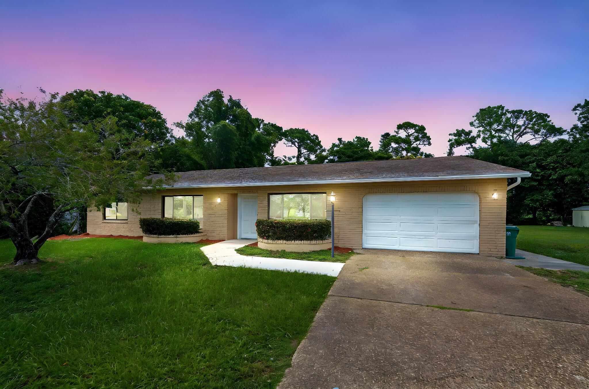 BEAUTIFULL Three bedroom, Two Bath, Two Car Garage POOL HOME with large screened porch and fenced yard! The perfect home for entertaining and summer fun in the pool! This home features an updated granite kitchen w/island, designer backsplash, white shaker cabinets, SS appliances, tile flooring and updated bathroms! Fresh paint inside and out! You wil love the open floor plan with formal living room, family room and nearly 2,000 sq ft of living area! NEW AC in 2020, NEW Impact windows in 2020, and NEW attic insulation in 2020! RE-ROOF in 2012! Home has City water and sewer, no tax assessments. Clean and move in ready! Excellent location convenient to area shopping, schools, restaurants, boat ramps and beaches.