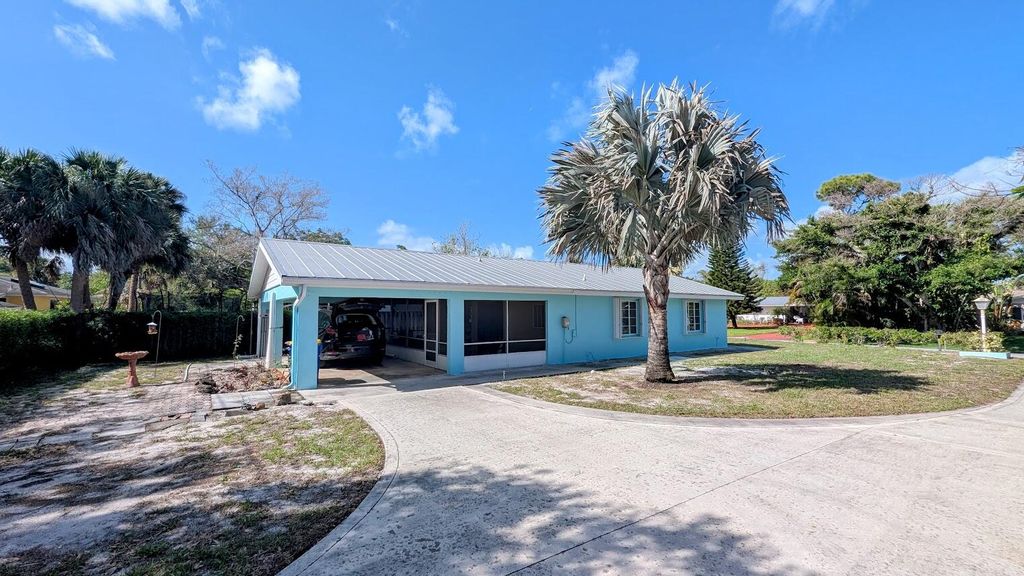 Photo of 1097 NE Kubin Avenue, Jensen Beach, FL 34957 (MLS # B26013986)