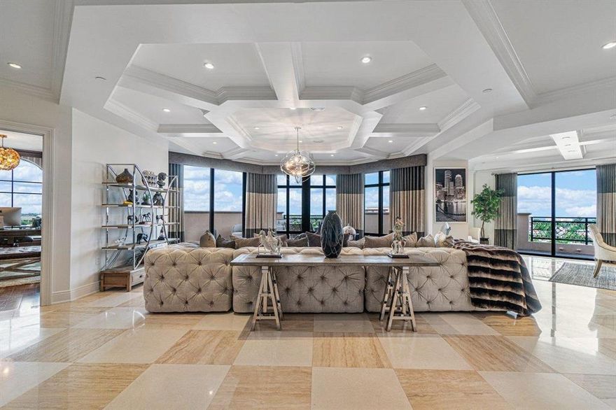 Completely remodeled contemporary penthouse. Every room features sprawling ocean and or downtown city views. This stunning 3 bedroom, 3.5 bath plus office and media room features exquisite marble and wood flooring detail throughout entire residence. 10 foot custom coffered ceilings, large beautiful gourmet kitchen with top of the line appliances, three large terraces with outdoor bar and expansive views. This penthouse boasts stunning finishes and absolutely breathtaking interior design. This penthouse also comes with it's own separate 4 car garage within the parking garage. Building also offers professional security, concierge, and valet services.