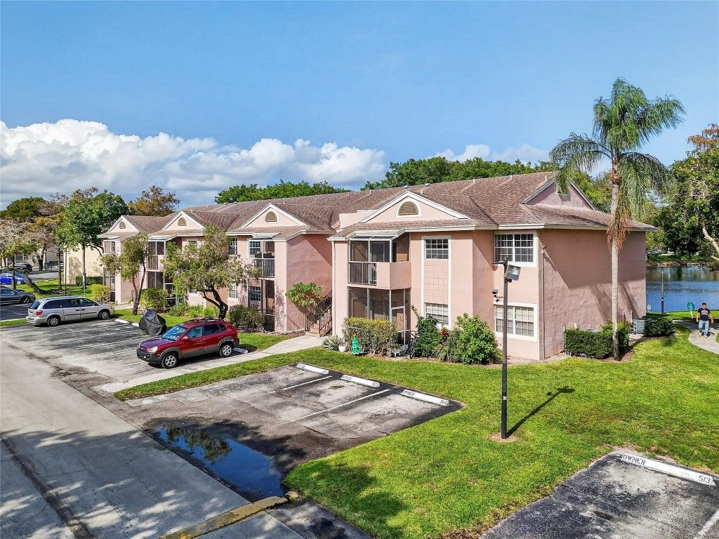 Photo of 641 Cypress Lake Boulevard #E18, Pompano Beach, FL 33064 (MLS # F10542047)